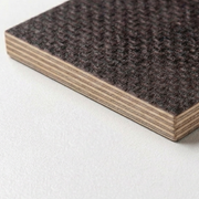 Close-up of a brown textured mat on a white background