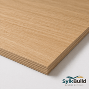 Stack of wooden panels on a white background with SylkBuild logo.