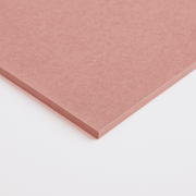 Pink sheet of Fire-Rated MDF on a white background