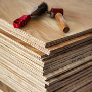 Stack of Marine Plywood panels with a tools on top